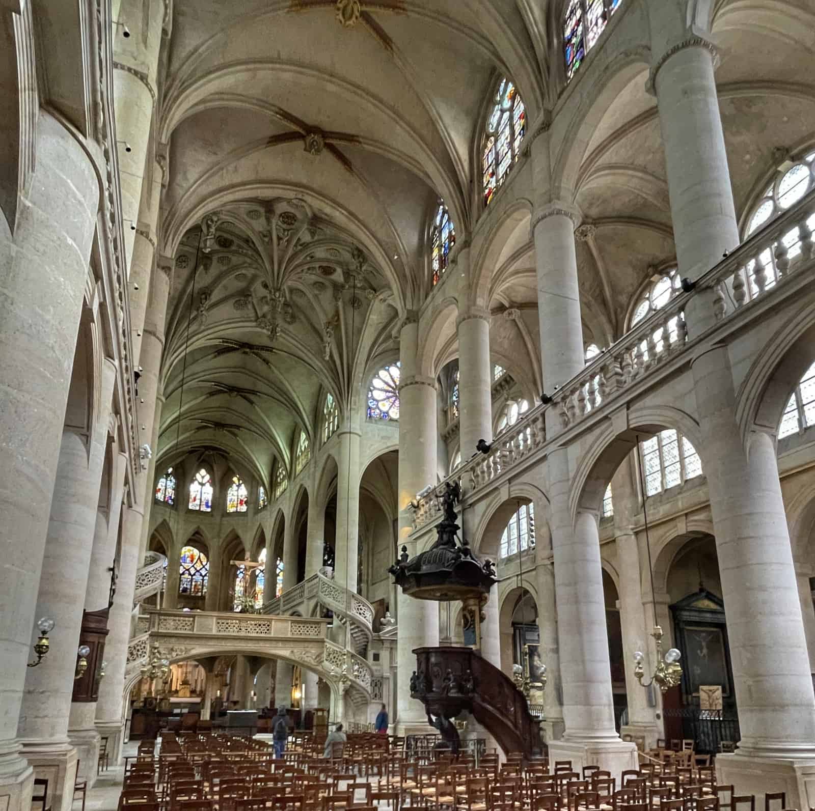 The nave, showing the rood screen, pulpit and ceiling details
